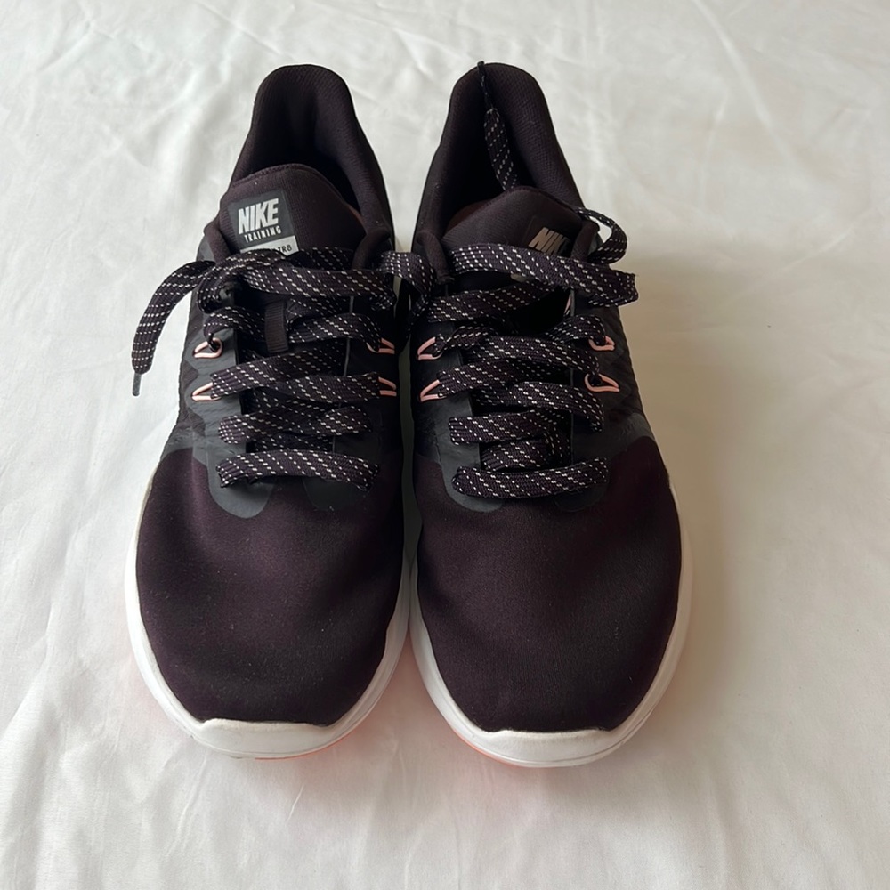 Nike, women’s 8.5, dark purple color